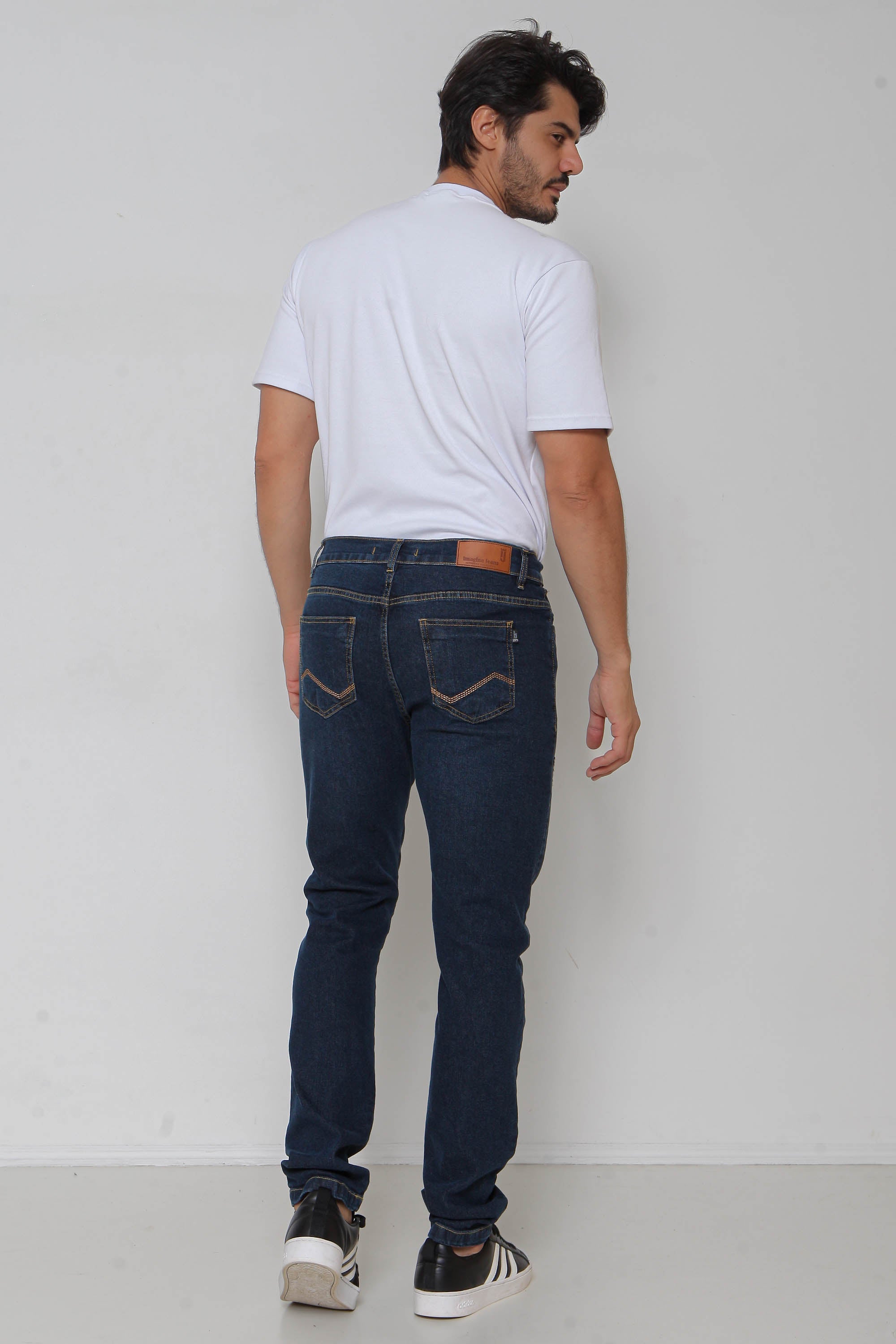 Calça Jeans Masculina Skinny Escura com Puídos